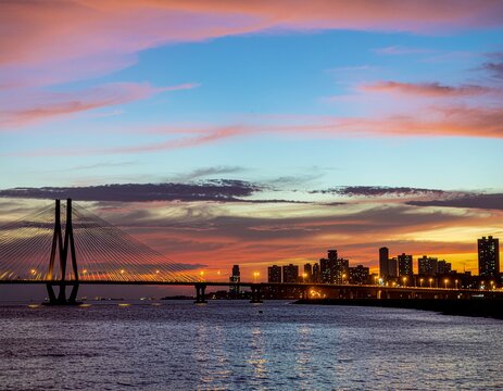 Bandra Worli Sea Link glowing beautifully during a dramatic Mumbai sunset