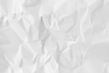 Fototapeta premium Abstract white crumpled paper texture background. Creased messy paper sheet with shadows and folds for creative minimalist design concept.