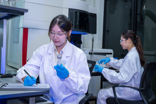 Scientific research in laboratory experimentation with equipment high-tech environment focused viewpoint