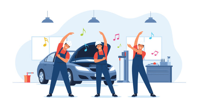 Team of auto mechanics in blue overalls and white hard hats perform stretching exercises together inside a professional car repair garage.