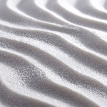 Abstract texture of rippled white sand
