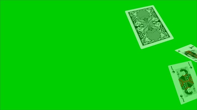 Playing cards falling in midair with various suits and designs on a vibrant green background for creative projects