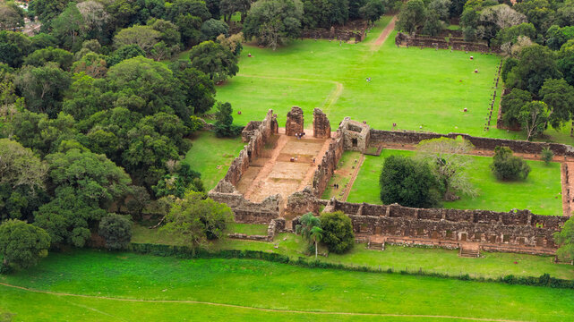 Aerial view of San Ignacio Min&iacute; Jesuit mission ruins over green fields, Misiones, Argentina, UNESCO World Heritage site