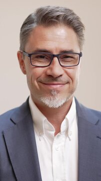 Middle age businessman in business casual. Entrepreneur in jacket. Mid adult, mature age man, happy smiling. Portrait isolated on white.