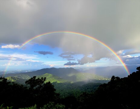 Landscape photo of Sahyadri mountain range with rainbow seen