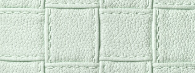 Fototapeta premium Texture light mint green leather background with quilted stitched pattern, macro. Abstract pastel sage upholstery surface