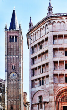 Parma Baptistery (12th century) and the adjacent gothic Bell Tower of the Parma Cathedral (13th century) in Parma, Italy, Europe 