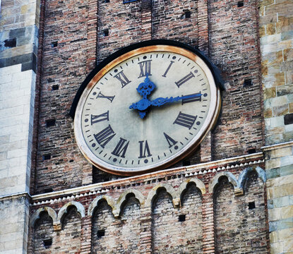 Clock on the bell tower of Parma Cathedral (Cattedrale di Santa Maria Assunta) in Parma, Italy, Europe 