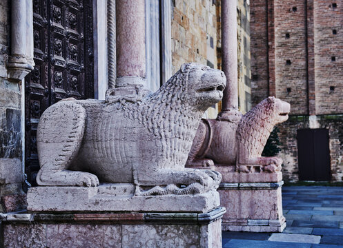 Stylophore lions crafted by the sculptor Giambono da Bissono in 1281, in front of the Parma Cathedral (Duomo di Parma) in Italy, Europe 