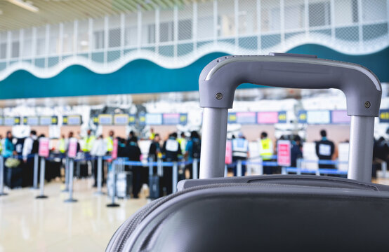 travelling suitcase, luggage or travel bags closeup at airport terminal