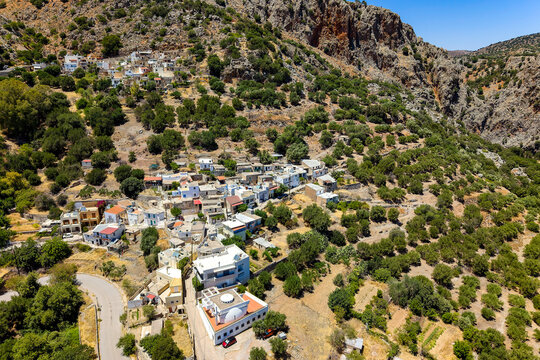 Aerial view of traditional white houses in the mountain village of Kritsa, Crete