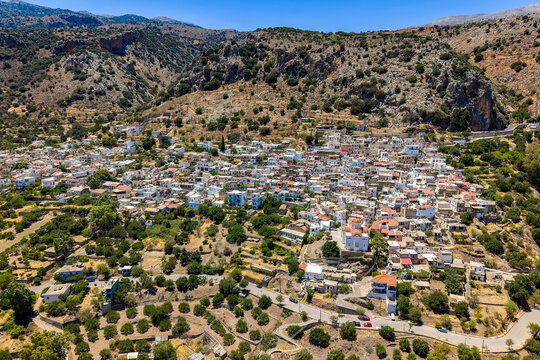 Aerial view of Kritsa village with white houses nestled in Crete mountains