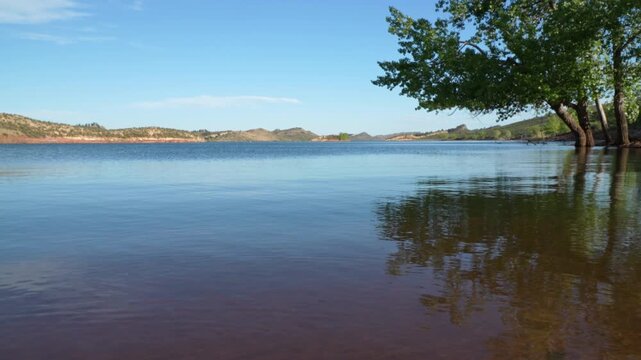 Horsetooth Reservoir in Colorado foothills near Fort Collins, springtime calm scenery with a light breeze