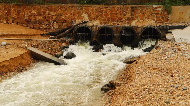Cooling water from industrial water tanks is used for wastewater treatment and discharged into pipes that flow into the sea and streams, eventually passing along the beach.
