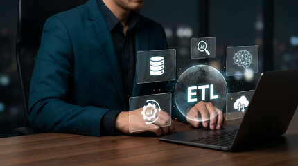 Naklejka premium Businessman working on ETL data integration process using laptop and digital icons