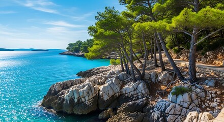 Obraz premium Serene coastal landscape with rocky shoreline.