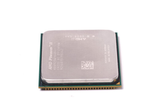 Detailed macro image showing CPU processor architecture and semiconductor AMD engineering technology components clearly visible