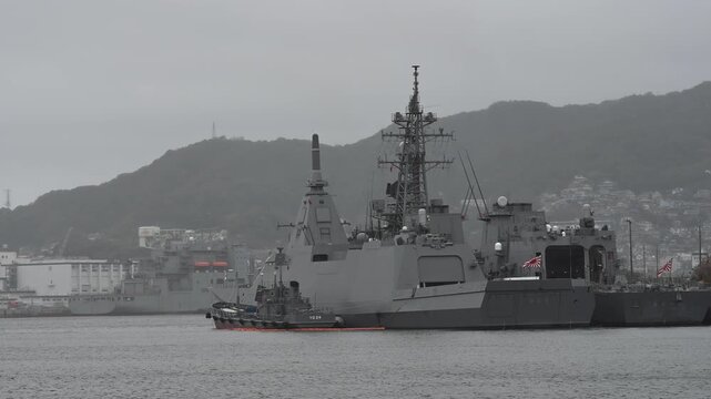Japanese maritime self-defense force warship at sasebo naval base