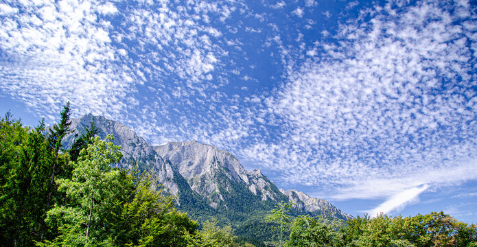 mountains on blue sky and clouds