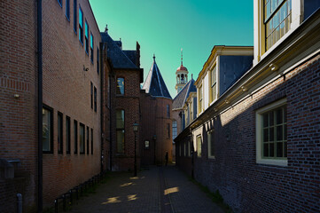 Fototapeta premium Historic facades of the Drents Museum in Assen, Netherlands. Traditional Dutch architecture, cultural heritage, preserved historic buildings and urban museum atmosphere in Drenthe province.