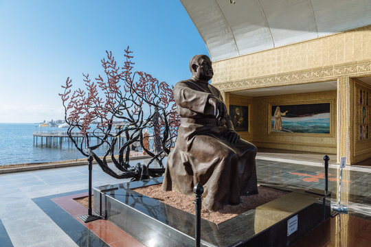 Cholpon Ata, Kyrgyzstan - February 28, 2025: Bronze statue and decorative tree sculpture at Ruh Ordo cultural complex on the shore of Issyk Kul Lake in Cholpon Ata, Issyk Kul Region, Kyrgyzstan