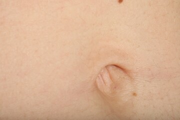 Fototapeta premium Closeup view of normal skin with belly button