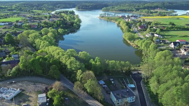Drone Shot of Lakeside Area with Trees and Farmland &ndash; 4K ProRes