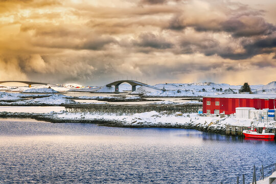 Amazing morning view of small fishing village Ramberg and  Fredvang bridge at sunset.