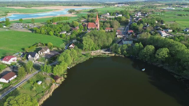 Drone Shot of Lakeside Area with Trees and Farmland &ndash; 4K ProRes