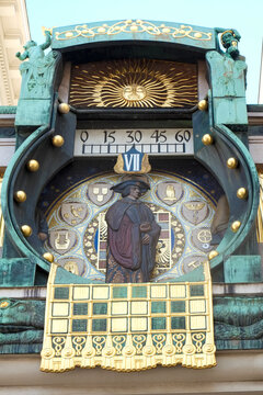 Ornate animated clock with moving figures and enamel detail