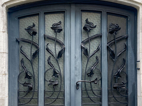 Art Nouveau door with sculptural floral metalwork
