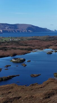 Aerial of the historic Ringfort at Lough Doon, Portnoo, County Donegal, Ireland
