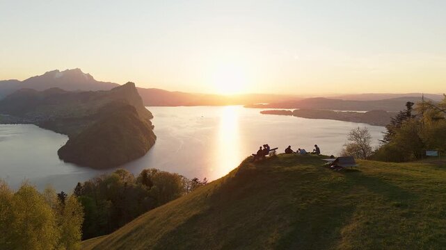 Aerial Drone View of People Watching Sunset Over Lake Lucerne from M&auml;rib&auml;nkli Viewpoint Above Vitznau, Rigi, Switzerland