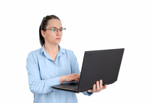 Professional businesswoman holding and using laptop isolated on white background, suitable for remote work, technology and business concepts