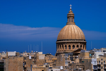 Fototapeta premium Close up of Majestic Dome of Basilica of Our Lady of Mount Carmel Over Valletta City Roofs, Malta