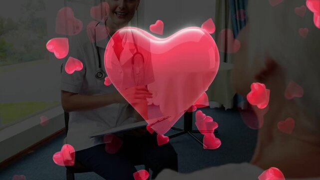 Nurse documenting during health consult while red hearts pulsing then breaking revealing clipboard