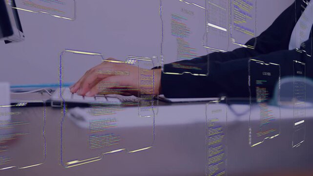 Business woman typing at desk, right hand shifting, moving UI panels around hands reviewing data