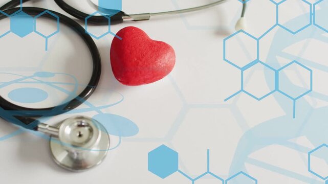 Red heart prop anchoring as camera drifting revealing hexagon with stethoscope showing health link