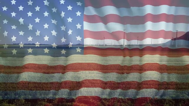 Semi-transparent American flag appearing over marshland shoreline, rippling and displaying pride