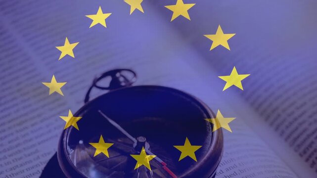 Star ring appearing over compass on book, stars rotating, needle shifting, highlighting EU motif