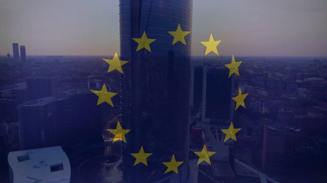 Star ring fading in, camera pulling back, rotating stars glowing, marking EU over glass tower