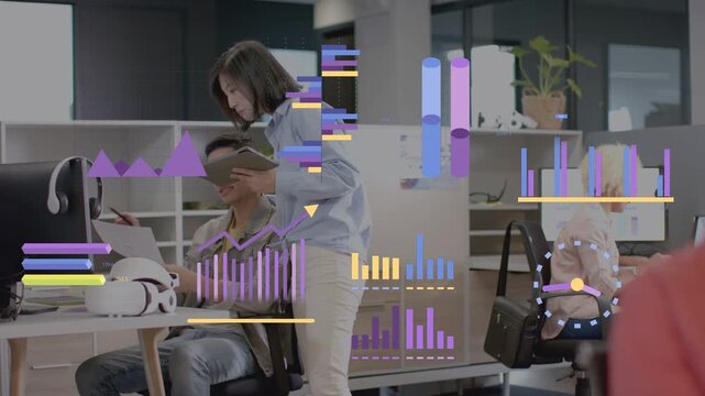Woman showing tablet guiding man reviewing laptop, charts overlaying aiding business analysis