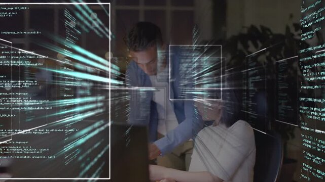 Standing man gesturing guiding seated woman typing at monitor for debugging hologram code streaming
