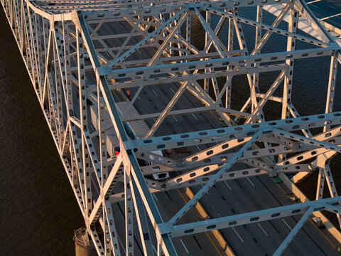 Aerial view of the George Rogers Clark Memorial Bridge showing the intricate steel truss structure and roadway over the Ohio River in Louisville, Kentucky, United States.