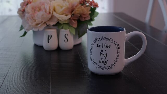 Man enjoys comfortable morning reading classical literature and drinking black coffee from cute mug - Comforts of working from home concept