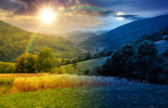 rural field on the hill. time change concept. view in to the valley at twilight. sun and moon over countryside mountain landscape. alpine pasture near forested hills. uncertainty and trust issues