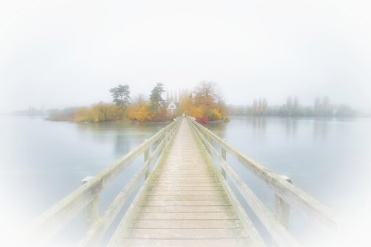 Wooden bridge to Werd Island with Franciscan monastery St. Otmar near Stein am Rhein, Eschenz municipality, Canton Thurgau, Switzerland