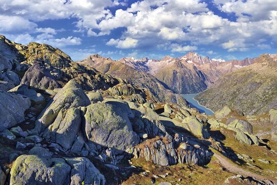 Grimsel area near N&auml;gelisgr&auml;tli with granite rocks, view over Lake Grimsel and Mount Finsteraarhorn, Canton Bern, Switzerland