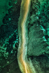 Aerial drone view of Lakdayan Sandbar near Coron Island, Philippines, featuring a curved tropical sandbar, turquoise coral reefs, crystal clear ocean water and a remote island landscape in Palawan. © akturer
