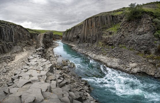 Stu&eth;lagil Canyon, turquoise river between basalt columns, Egilsstadir, Iceland